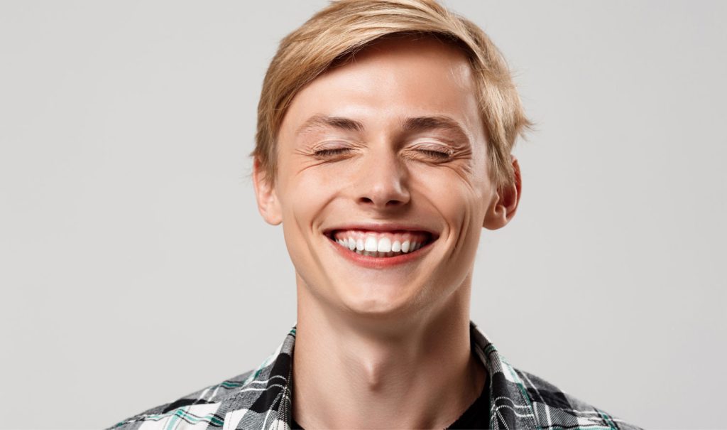 Man Smiling After Restorative Dentistry