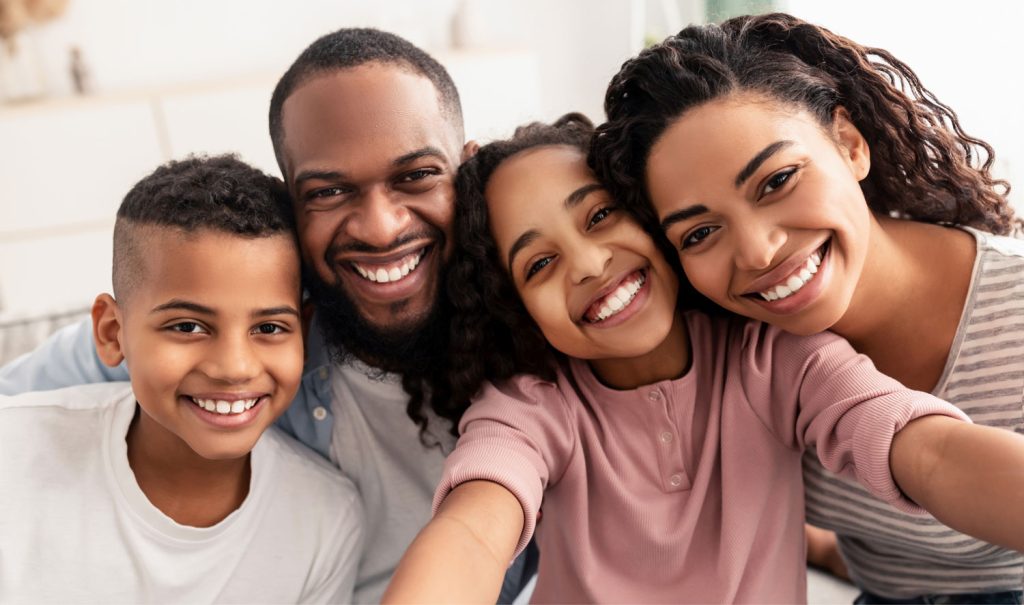Happy Family Taking A Selfie Together