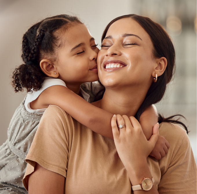Daughter and Mother Smiling