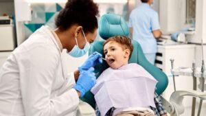 Dentist Examining Child
