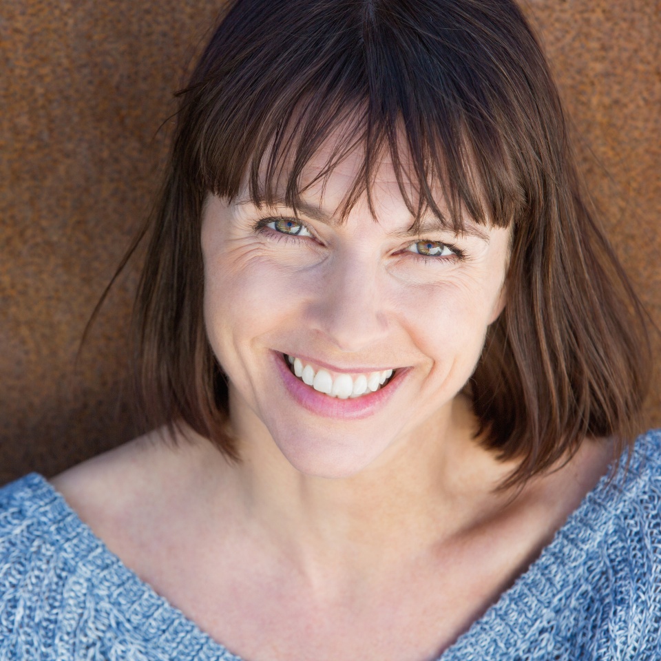 Close up portrait of a smiling middle aged woman